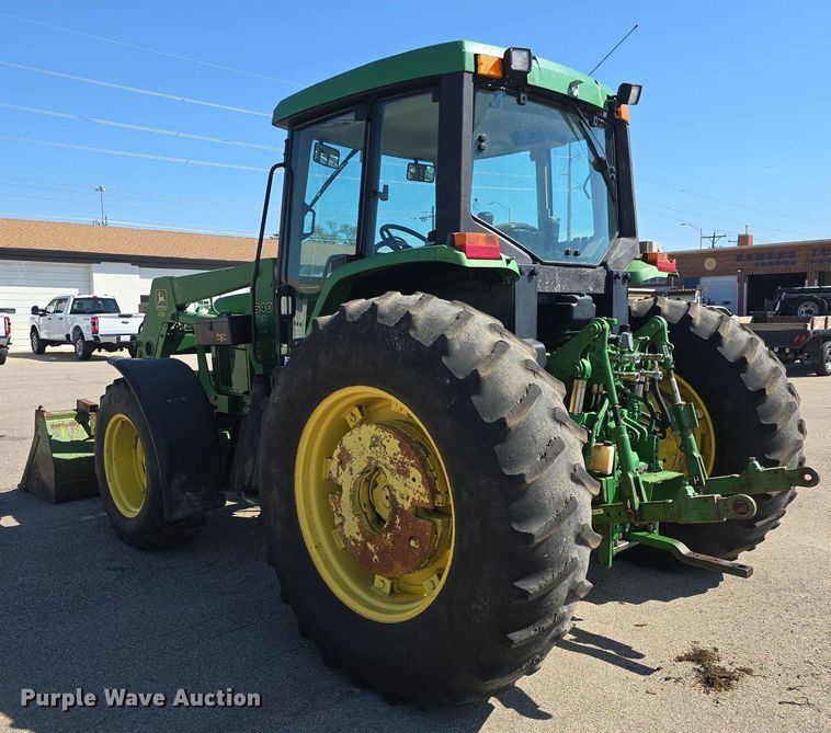 image for item DQ4605 1998 John Deere  6310 MFWD tractor