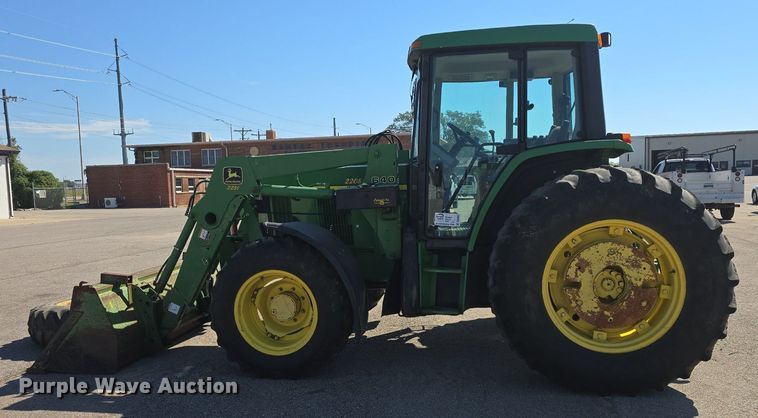 image for item DQ4605 1998 John Deere  6310 MFWD tractor