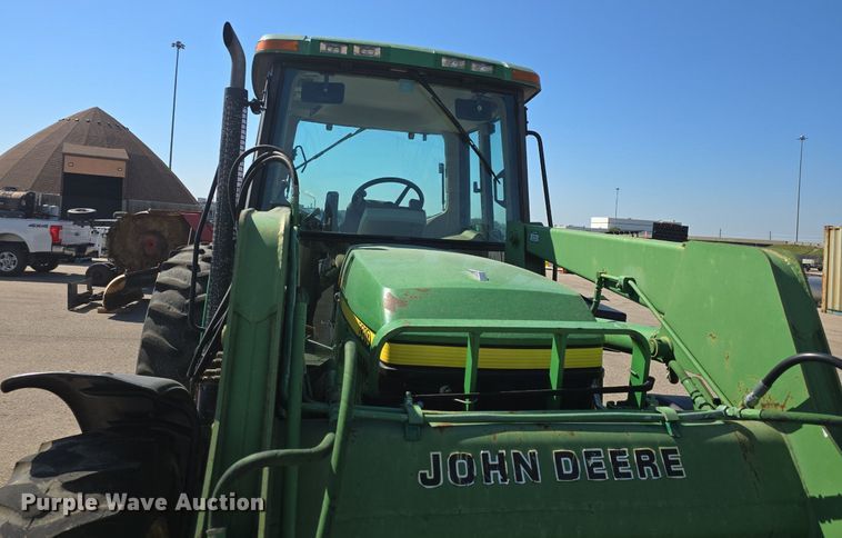 image for item DQ4605 1998 John Deere  6310 MFWD tractor