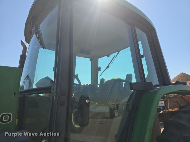 image for item DQ4605 1998 John Deere  6310 MFWD tractor