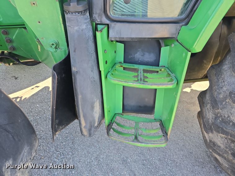 image for item DQ4605 1998 John Deere  6310 MFWD tractor