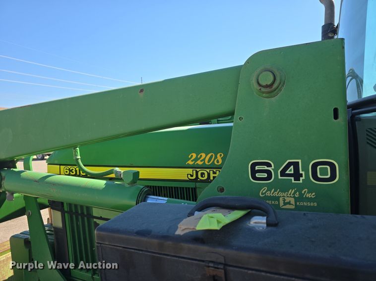 image for item DQ4605 1998 John Deere  6310 MFWD tractor