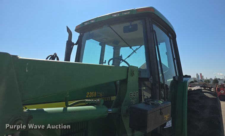 image for item DQ4605 1998 John Deere  6310 MFWD tractor