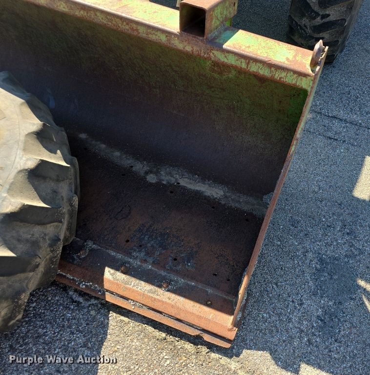 image for item DQ4605 1998 John Deere  6310 MFWD tractor