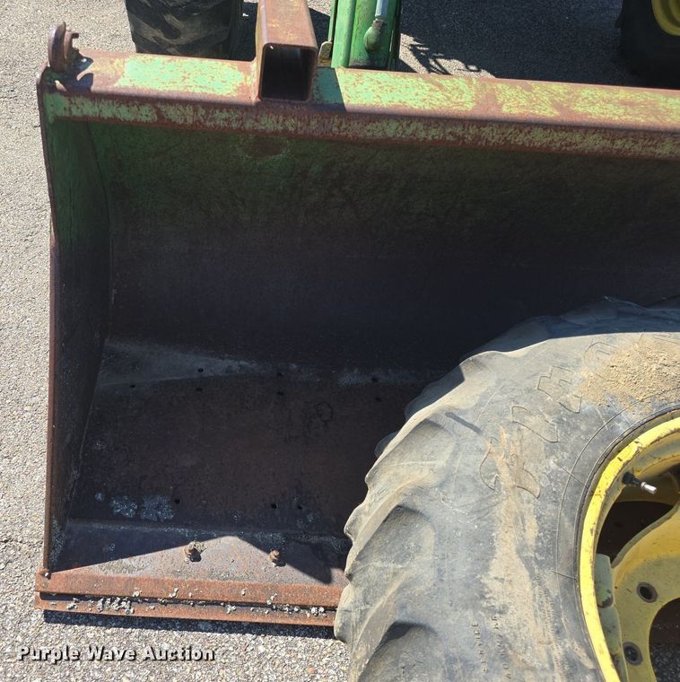 image for item DQ4605 1998 John Deere  6310 MFWD tractor