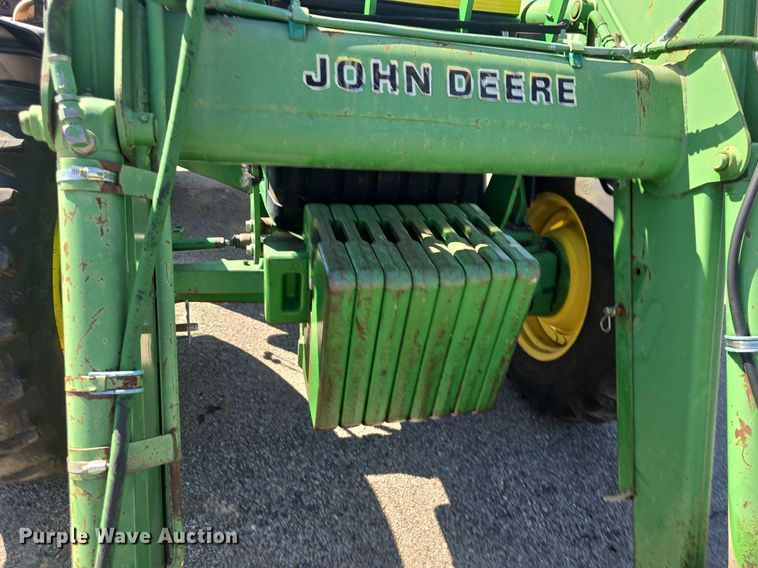 image for item DQ4605 1998 John Deere  6310 MFWD tractor