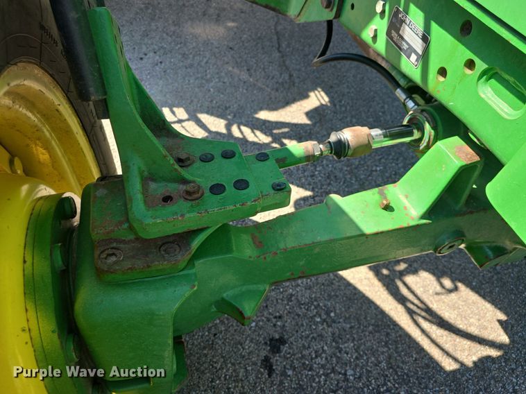 image for item DQ4605 1998 John Deere  6310 MFWD tractor