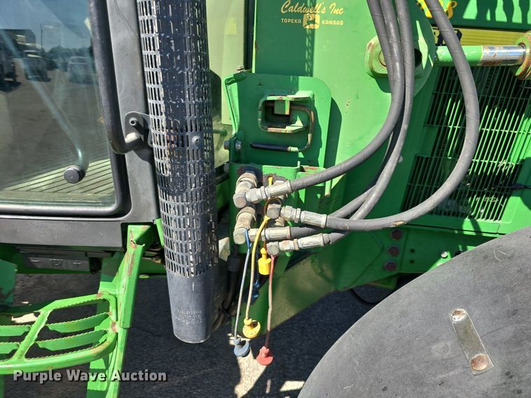 image for item DQ4605 1998 John Deere  6310 MFWD tractor