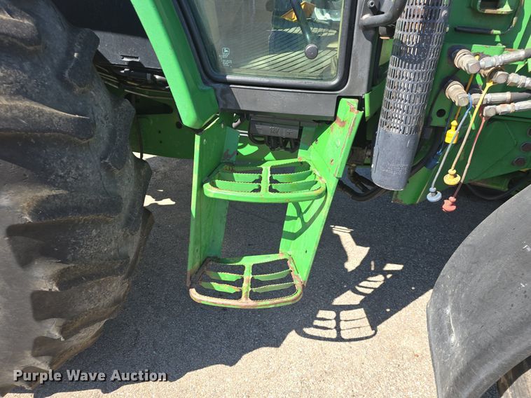 image for item DQ4605 1998 John Deere  6310 MFWD tractor