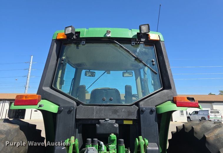 image for item DQ4605 1998 John Deere  6310 MFWD tractor