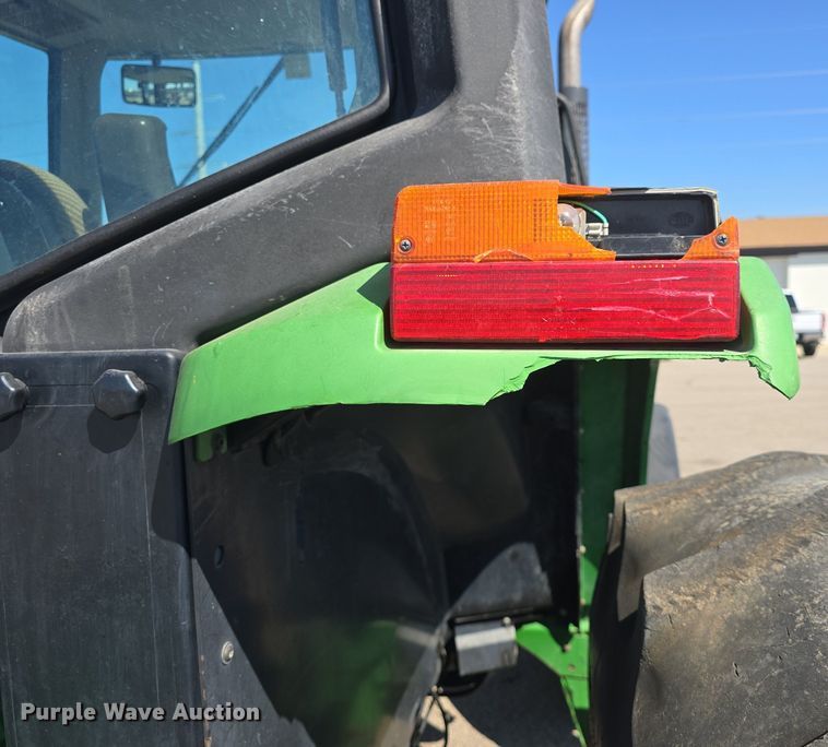 image for item DQ4605 1998 John Deere  6310 MFWD tractor