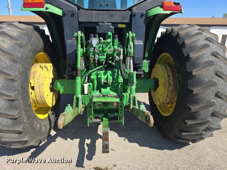 image for item DQ4605 1998 John Deere  6310 MFWD tractor