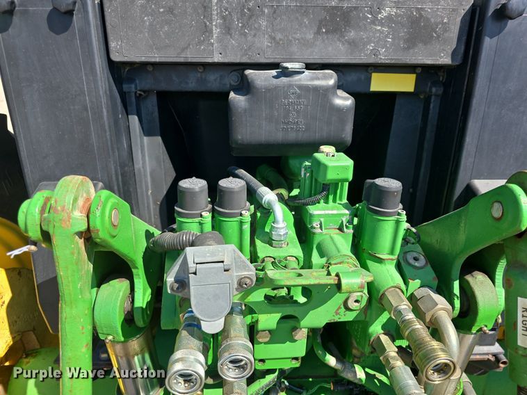 image for item DQ4605 1998 John Deere  6310 MFWD tractor