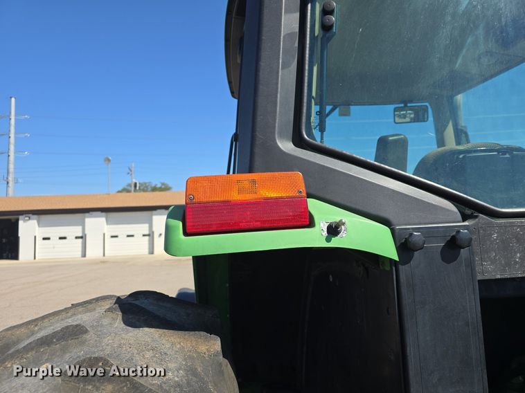 image for item DQ4605 1998 John Deere  6310 MFWD tractor