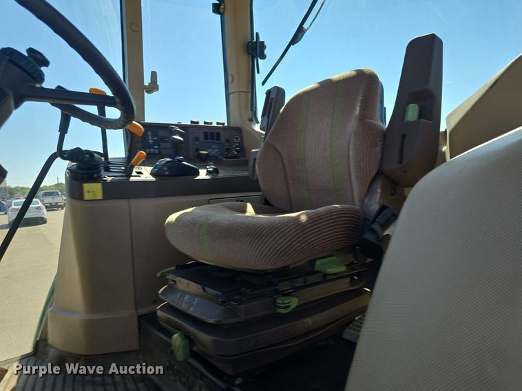 image for item DQ4605 1998 John Deere  6310 MFWD tractor