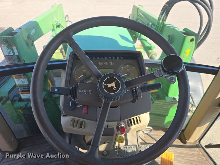 image for item DQ4605 1998 John Deere  6310 MFWD tractor