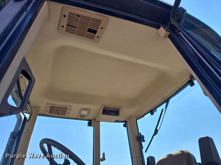 image for item DQ4605 1998 John Deere  6310 MFWD tractor