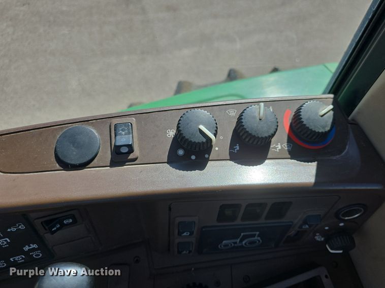 image for item DQ4605 1998 John Deere  6310 MFWD tractor