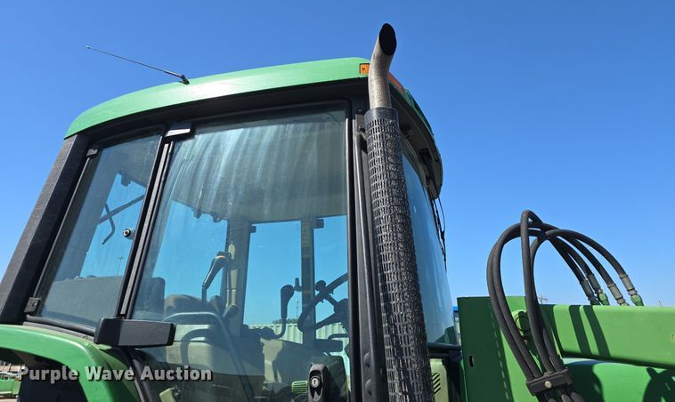 image for item DQ4605 1998 John Deere  6310 MFWD tractor