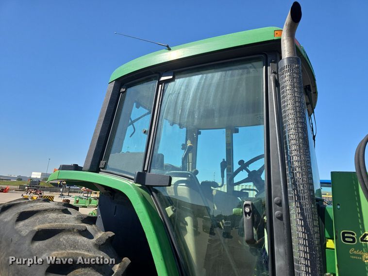 image for item DQ4605 1998 John Deere  6310 MFWD tractor