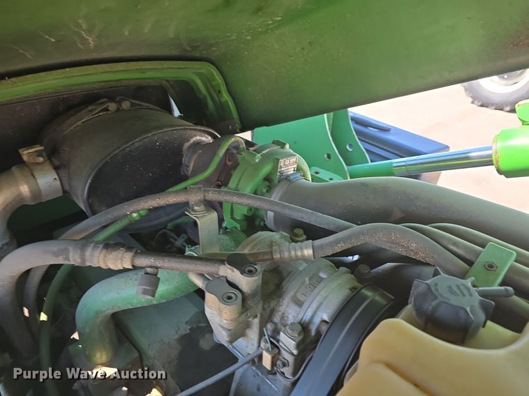 image for item DQ4605 1998 John Deere  6310 MFWD tractor