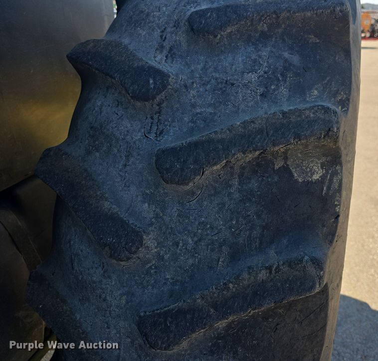 image for item DQ4605 1998 John Deere  6310 MFWD tractor