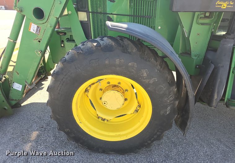 image for item DQ4605 1998 John Deere  6310 MFWD tractor