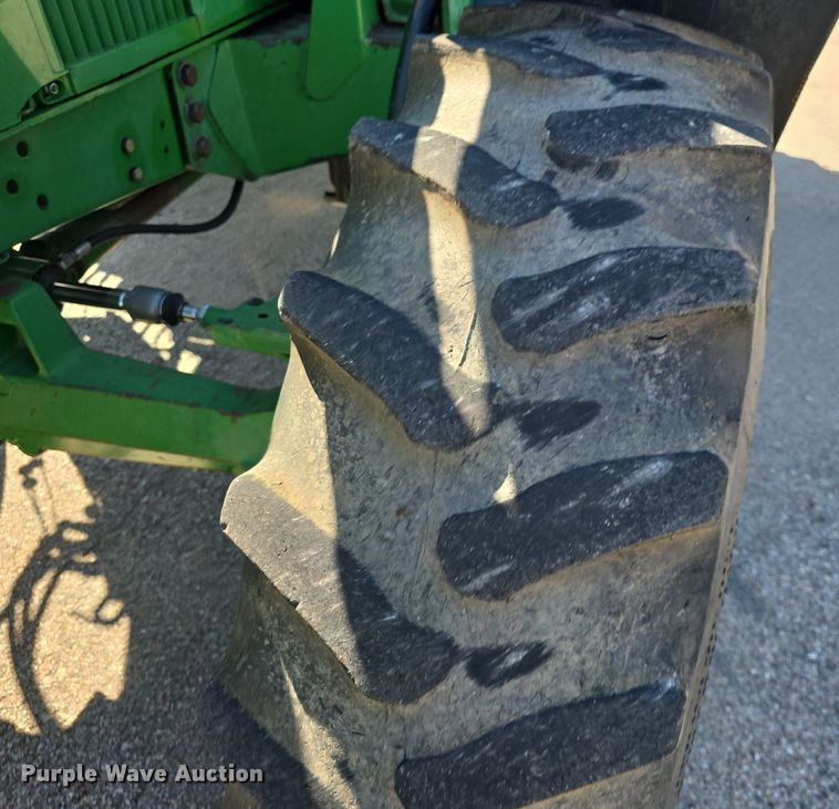 image for item DQ4605 1998 John Deere  6310 MFWD tractor