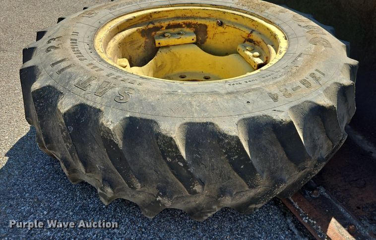 image for item DQ4605 1998 John Deere  6310 MFWD tractor