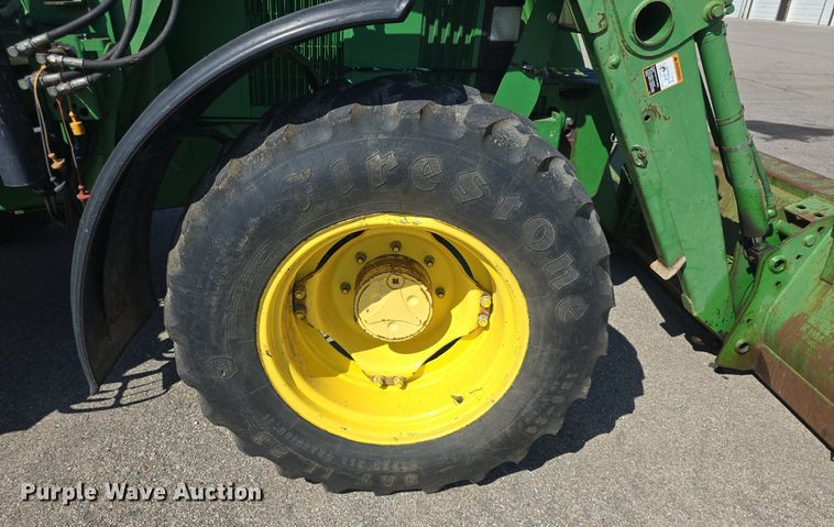 image for item DQ4605 1998 John Deere  6310 MFWD tractor