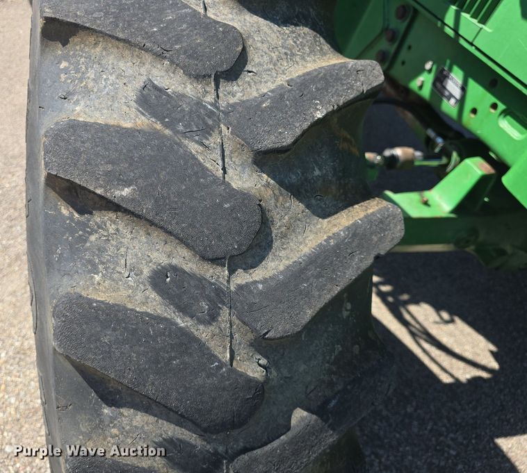 image for item DQ4605 1998 John Deere  6310 MFWD tractor