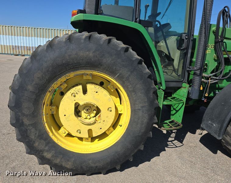 image for item DQ4605 1998 John Deere  6310 MFWD tractor