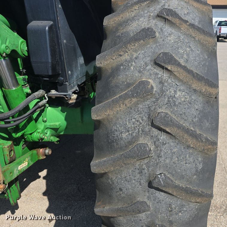 image for item DQ4605 1998 John Deere  6310 MFWD tractor