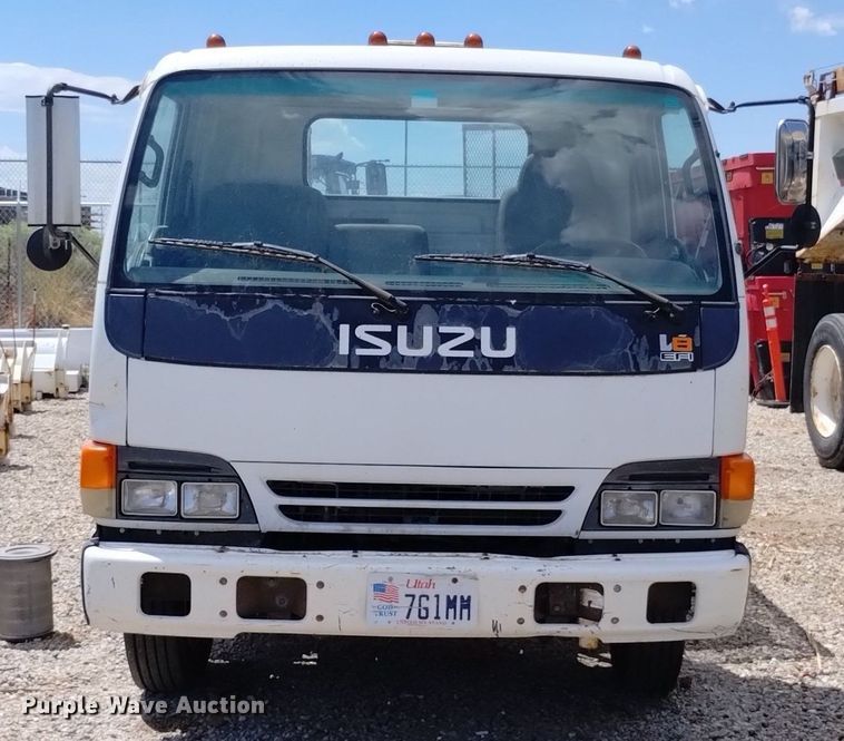 image for item DP3365 2003 Isuzu NPR flatbed truck