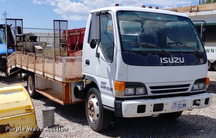 image for item DP3365 2003 Isuzu NPR flatbed truck