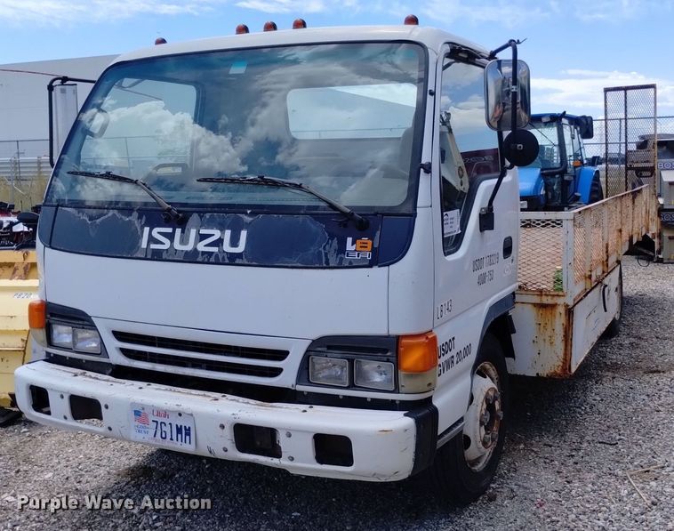 image for item DP3365 2003 Isuzu NPR flatbed truck