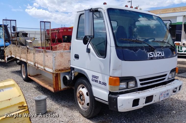 image for item DP3365 2003 Isuzu NPR flatbed truck