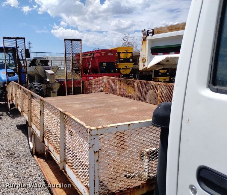 image for item DP3365 2003 Isuzu NPR flatbed truck