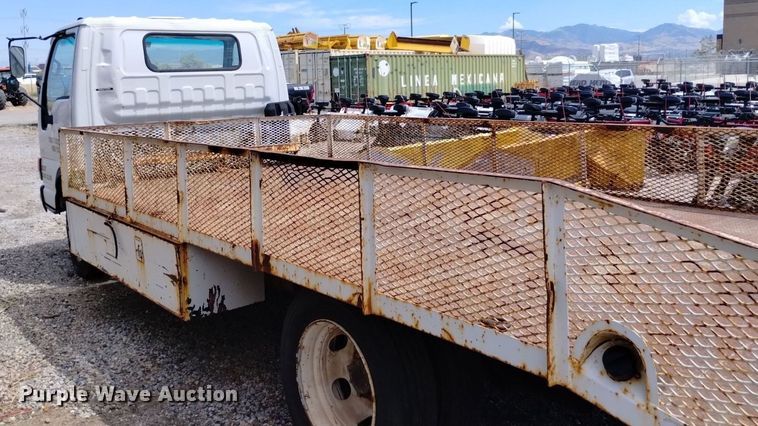image for item DP3365 2003 Isuzu NPR flatbed truck
