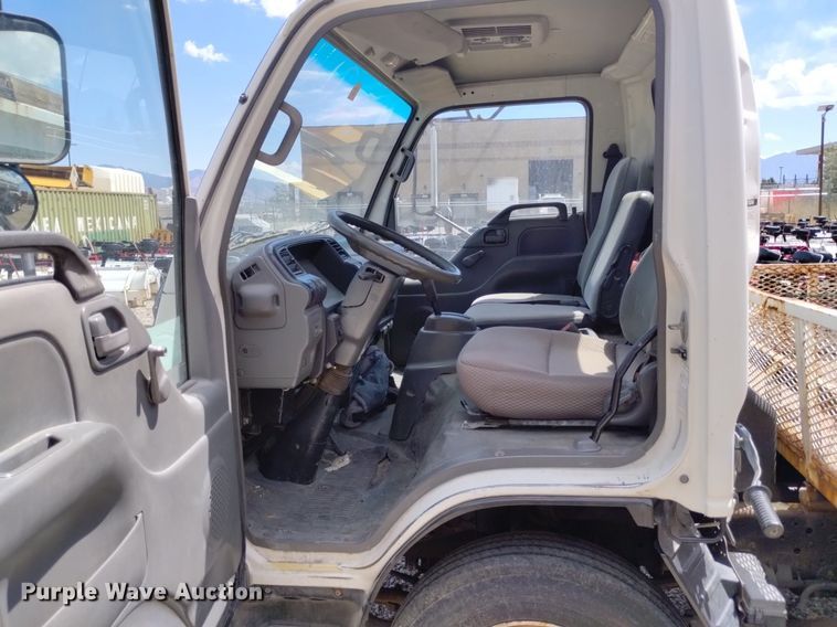 image for item DP3365 2003 Isuzu NPR flatbed truck