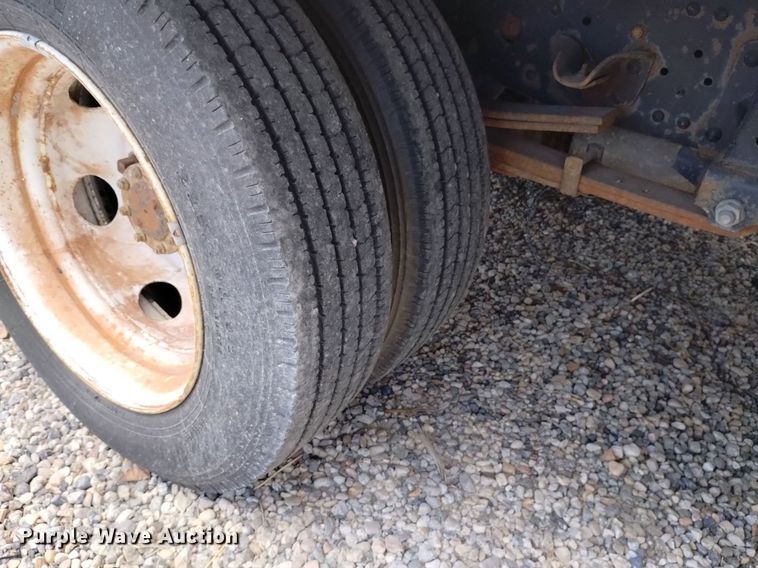 image for item DP3365 2003 Isuzu NPR flatbed truck