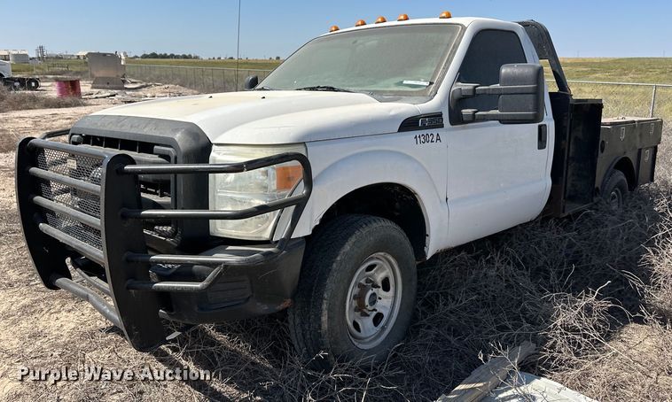 image for item OM9746 2011 Ford F350 Super Duty XL flatbed pickup truck