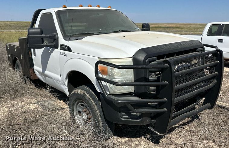 image for item OM9746 2011 Ford F350 Super Duty XL flatbed pickup truck