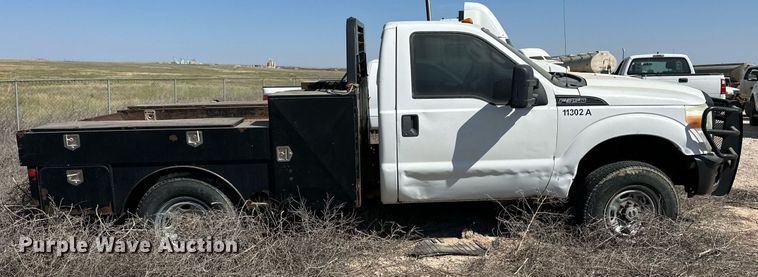 image for item OM9746 2011 Ford F350 Super Duty XL flatbed pickup truck