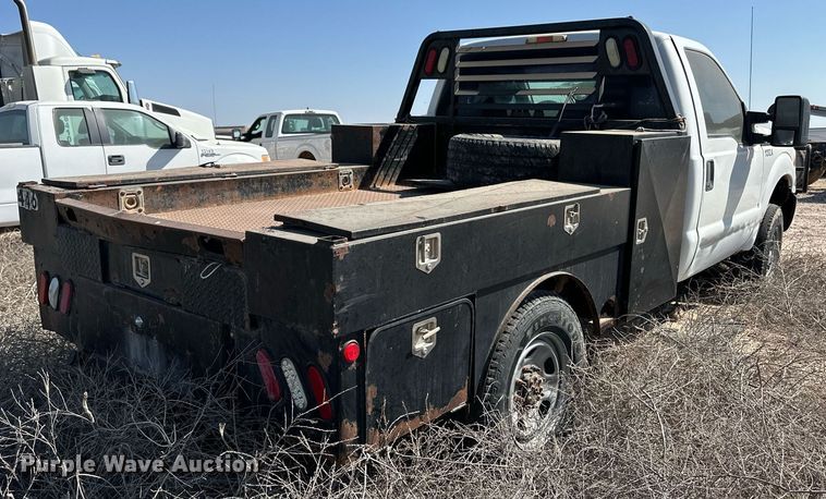 image for item OM9746 2011 Ford F350 Super Duty XL flatbed pickup truck