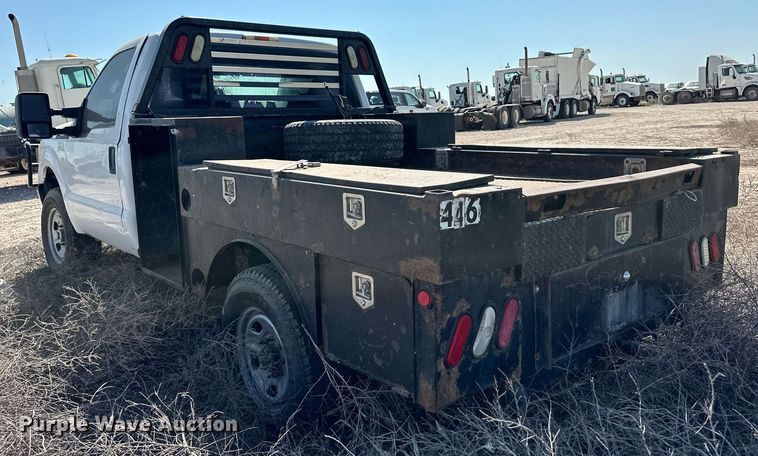 image for item OM9746 2011 Ford F350 Super Duty XL flatbed pickup truck