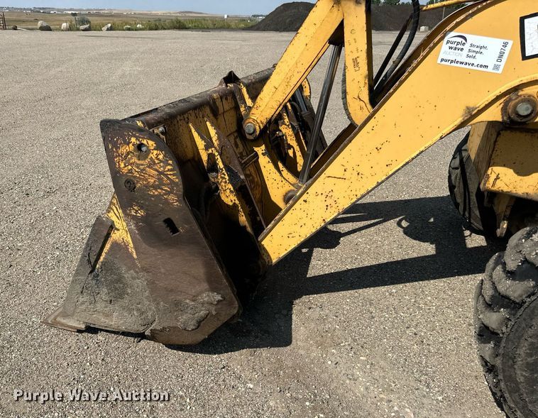 image for item DN0746 John Deere 210LE landscape tractor