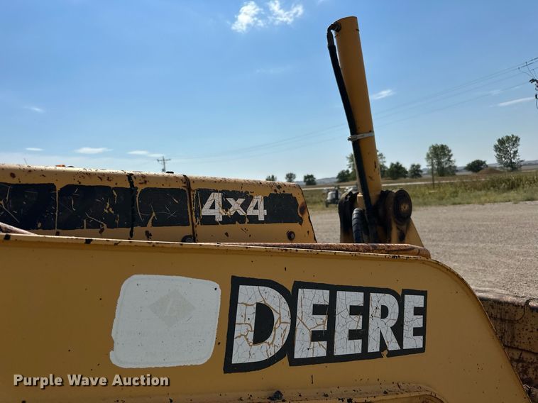 image for item DN0746 John Deere 210LE landscape tractor