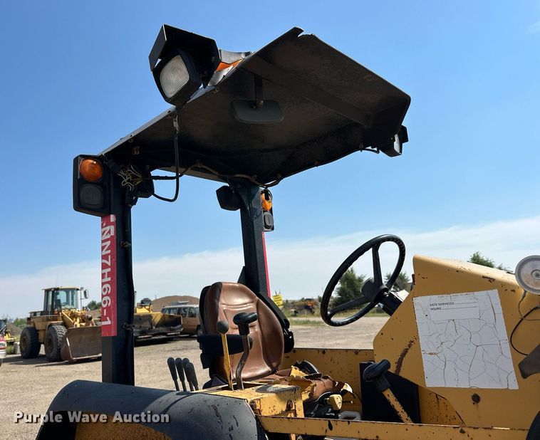 image for item DN0746 John Deere 210LE landscape tractor