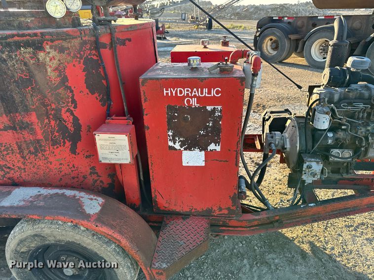 image for item DN0760 Crafco EZ Pour pot hole patcher 